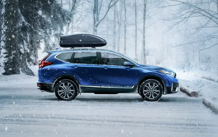 Blue Honda CR-V in Snow Pictures