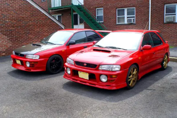 Gold and Black Rims on Red Car Pictures