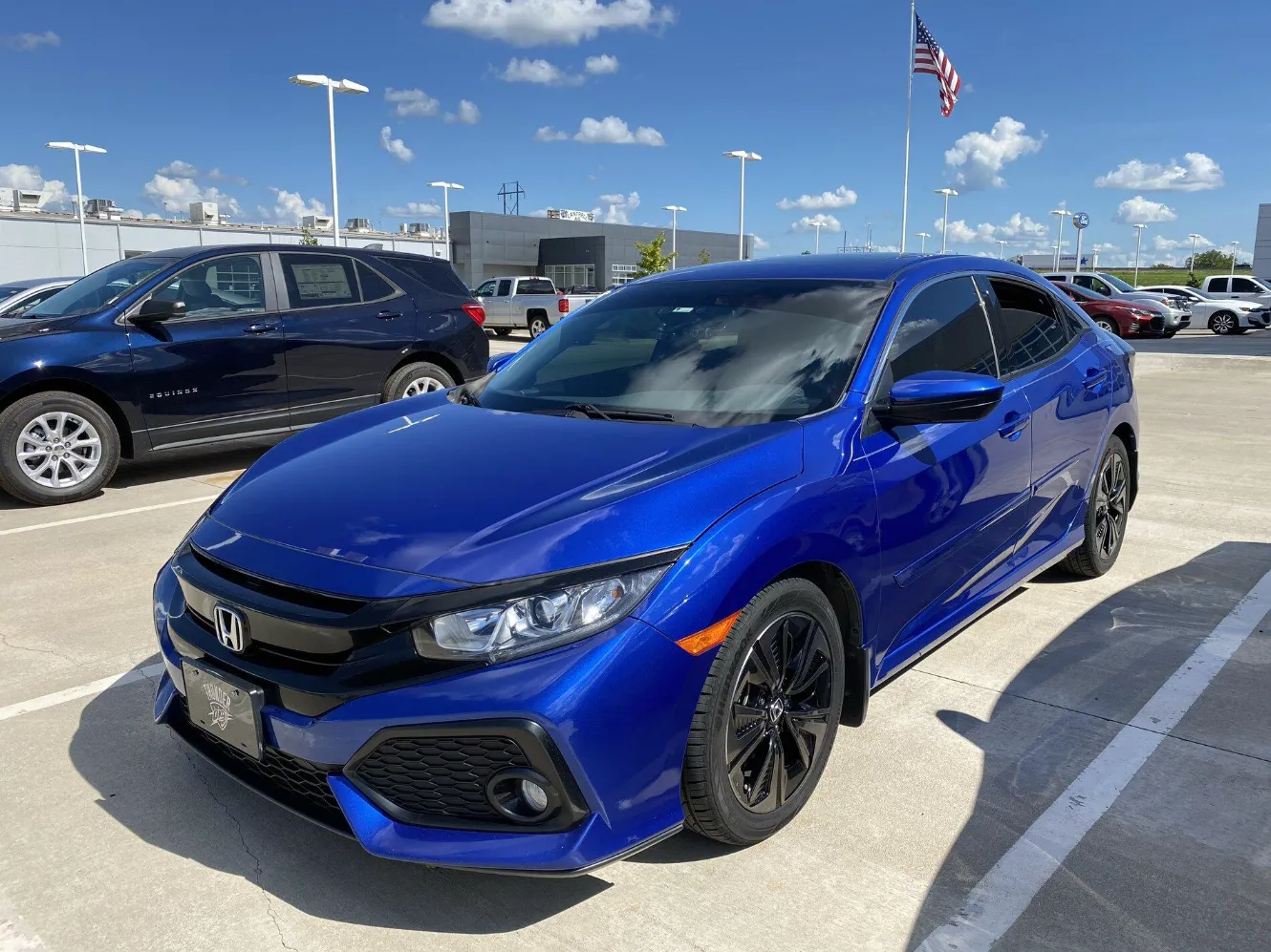 Blue Honda Civic with Black Wheels