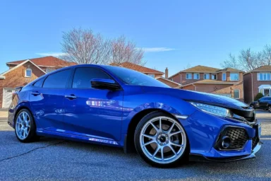 Blue Honda Civic with Silver Wheels