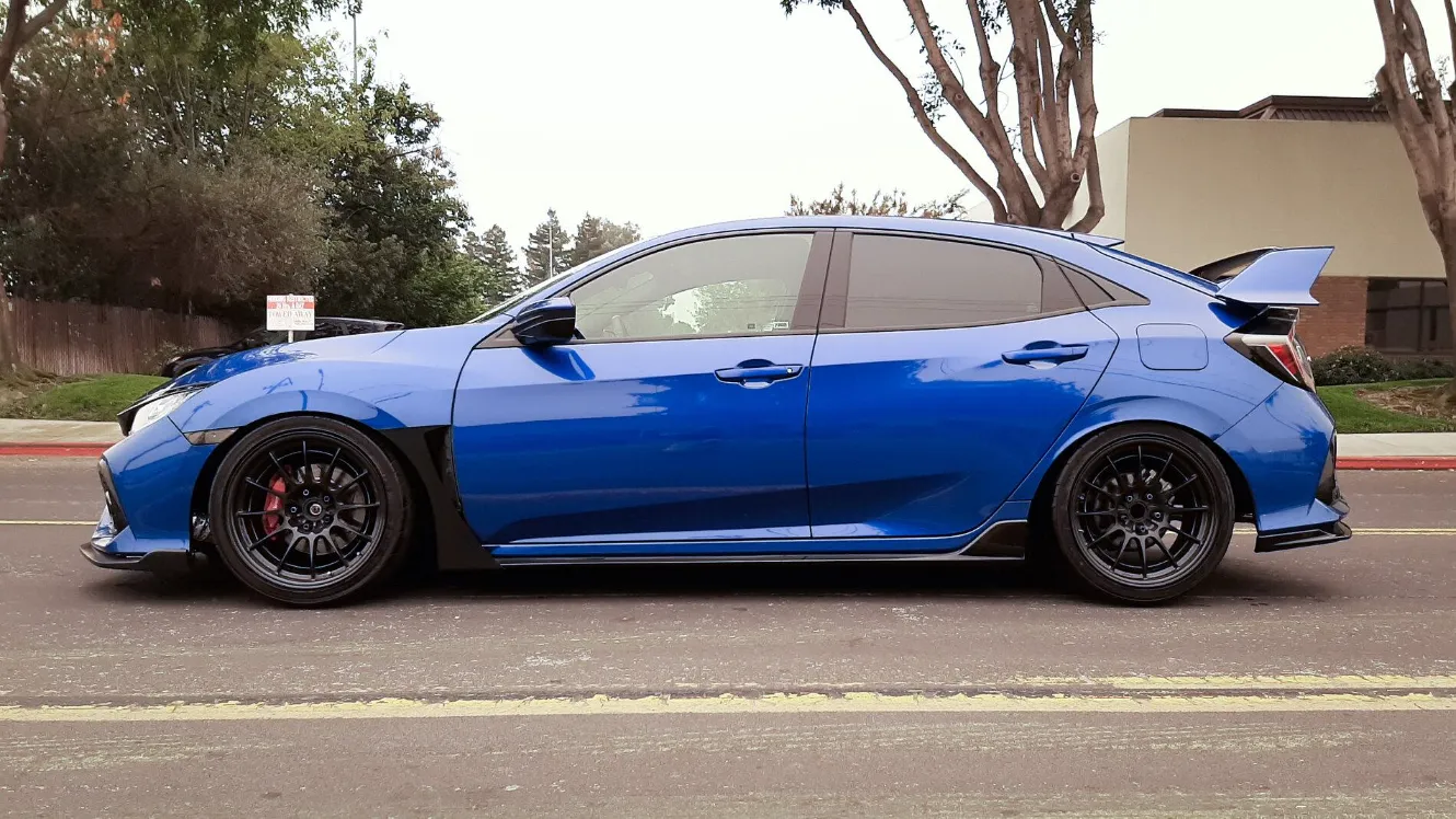 Nice Glossy Black Rims on Blue Car