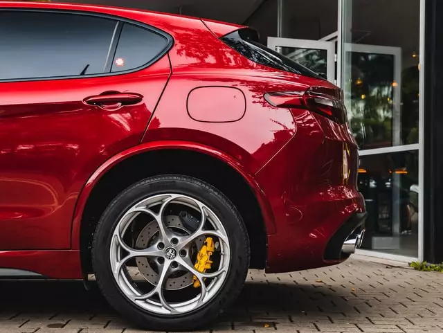 Red Car With Orange Brake Caliper