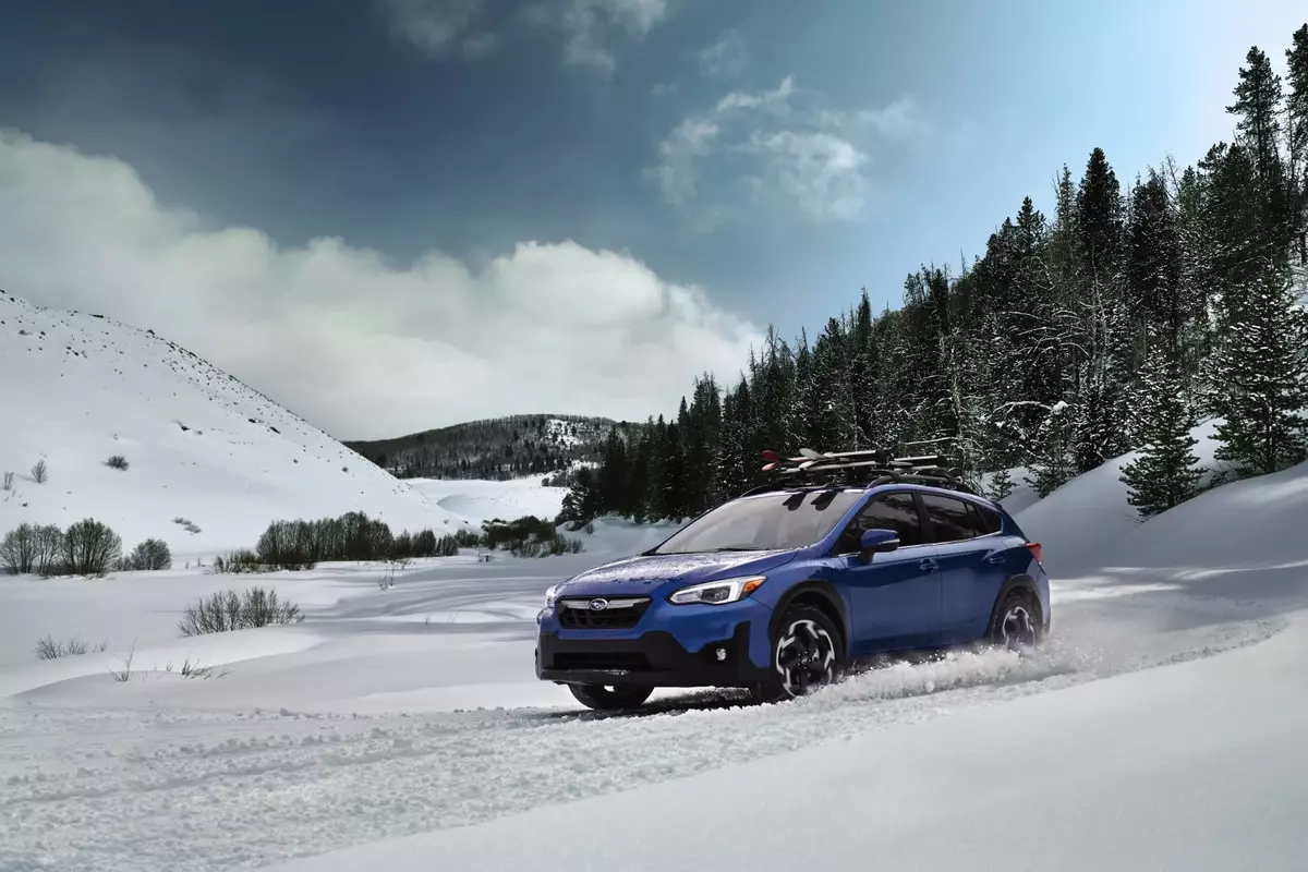 New Subaru Crosstrek driving in the snow