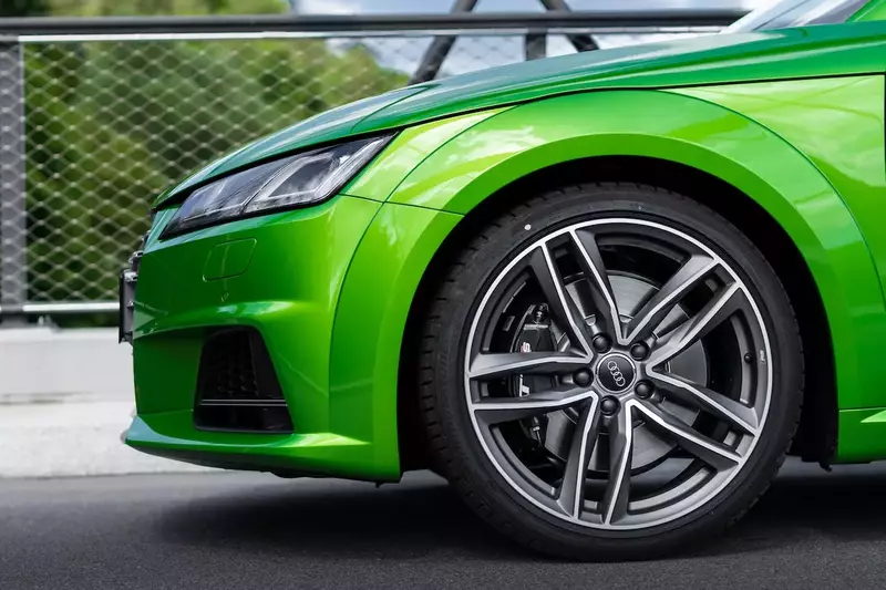 Green Car with Gunmetal Gray Rims