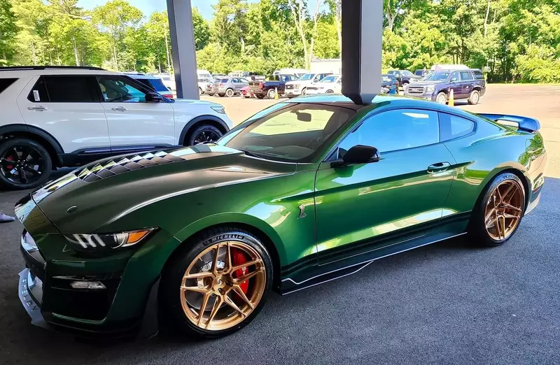Green Mustang with Gold Wheels