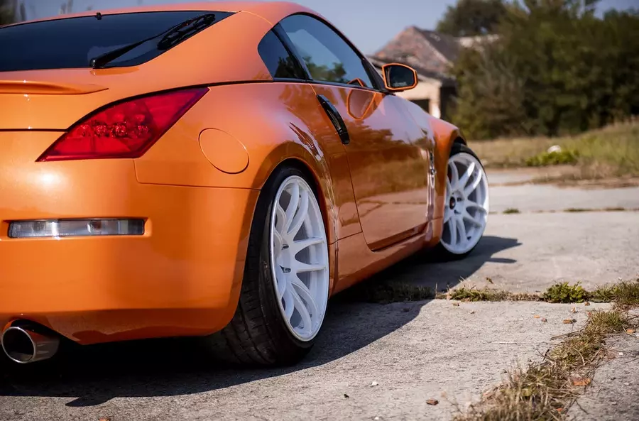 Orange Nissan 350Z with White Rims