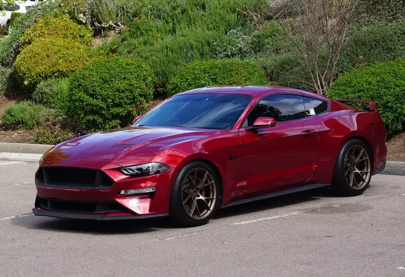 Red Ruby Mustang With Bronze Wheels