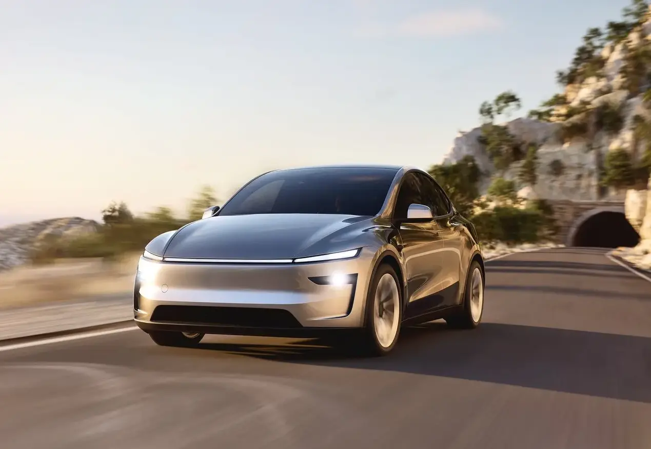 New Tesla Model Y With New Headlight Design Shown in Quicksilver Paint Color