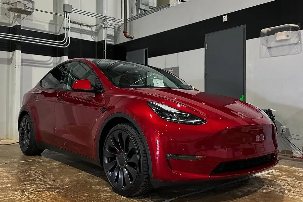 Ultra Red Tesla Model Y With Black Wheels