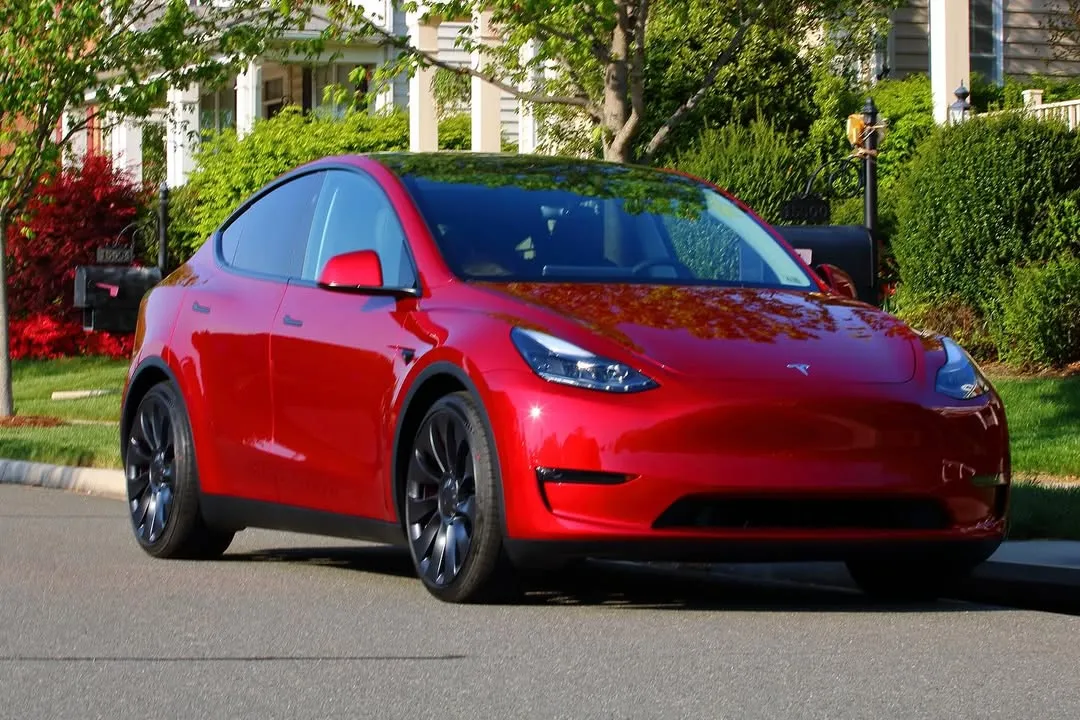 Ultra Red Tesla Model Y With Crossflow Wheels